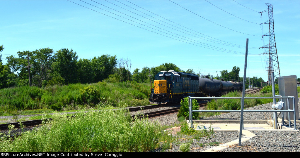 CSX 4451 with four tank cars.